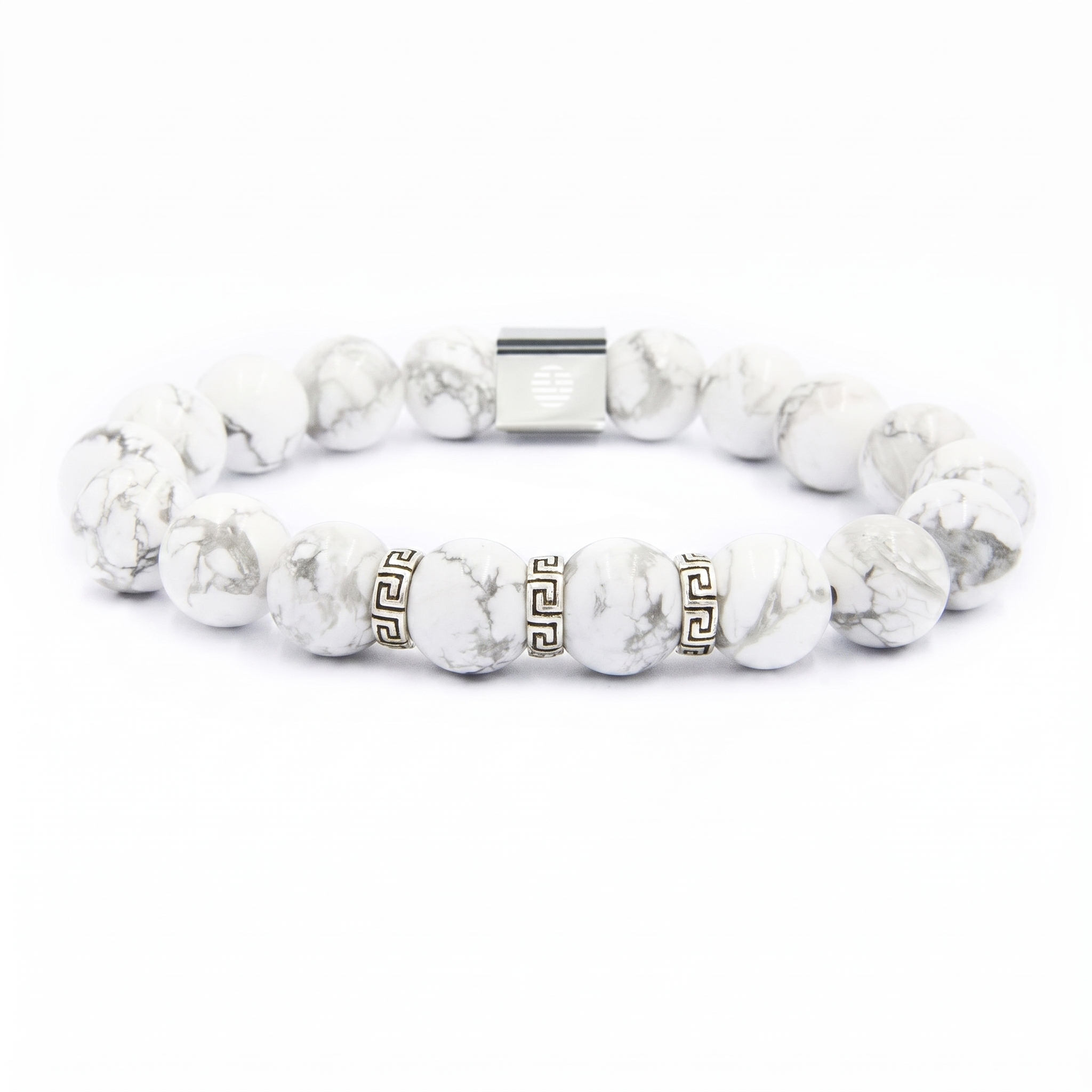 A beaded stretch bracelet made of white and gray marbled beads, featuring two gold Greek key pattern spacer beads and a silver magnetic clasp, shown on a plain white background.