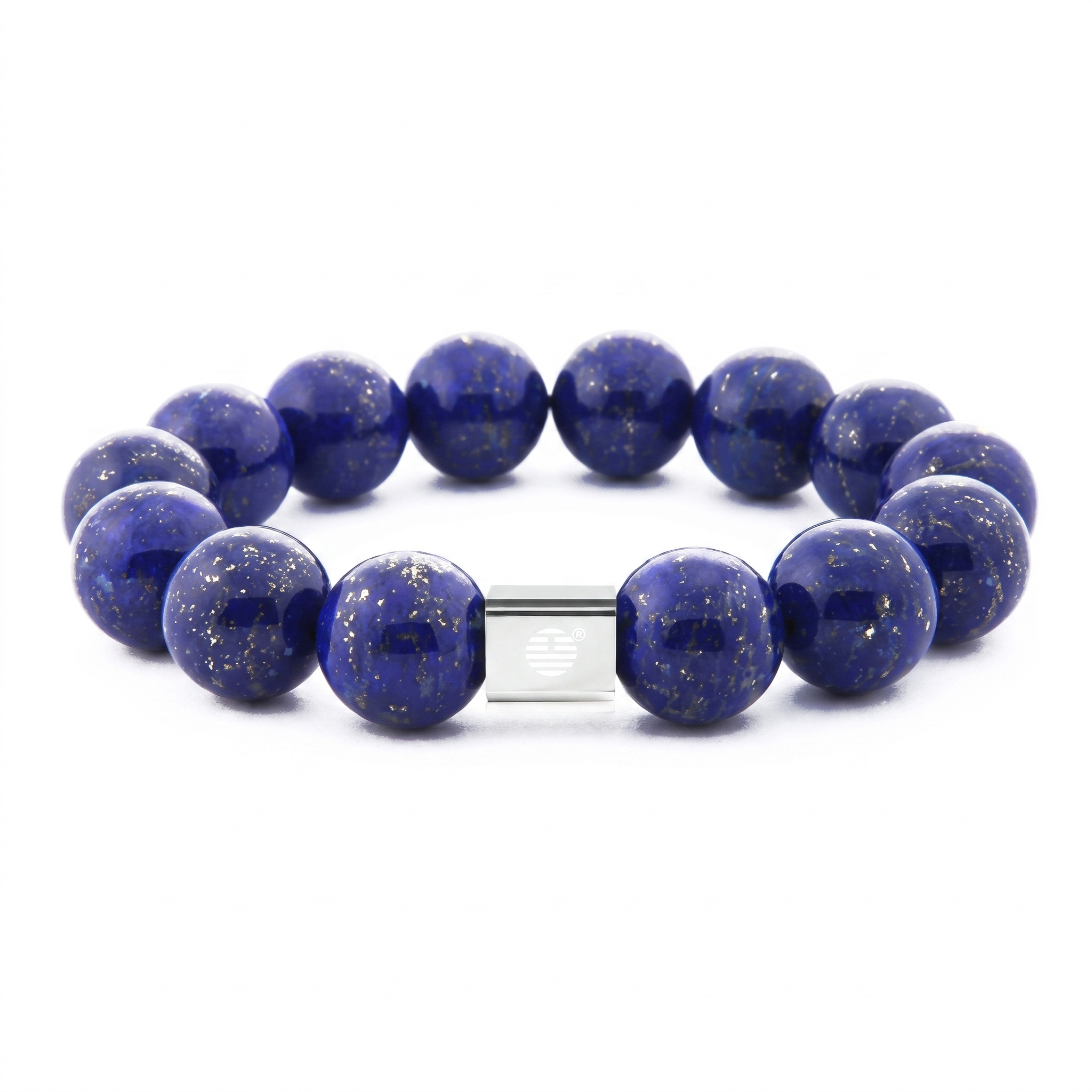 A beaded stretch bracelet made of deep blue lapis lazuli stones with tiny gold flecks, connected by a polished silver metal clasp, shown on a white background.