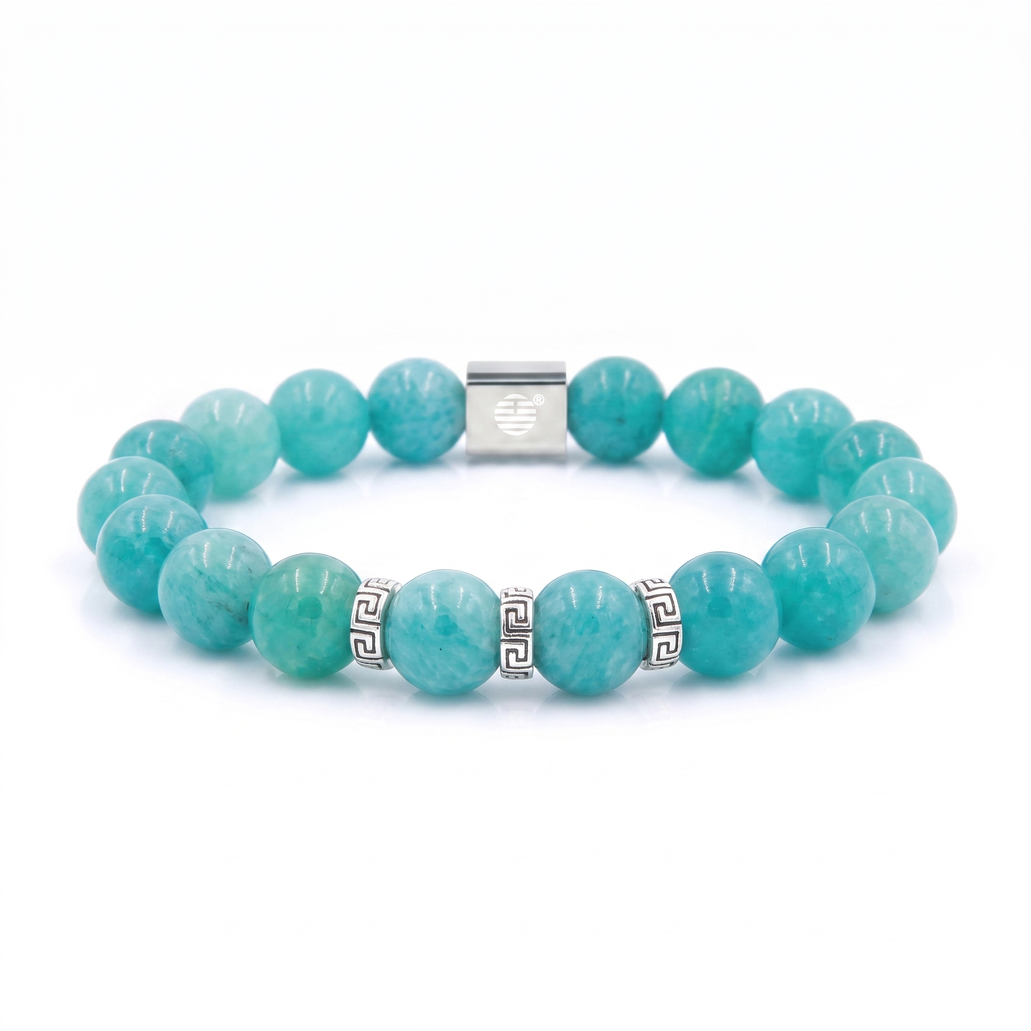 A beaded bracelet made of round turquoise-blue gemstone beads with silver-tone metal accents, including a central clasp and small Greek key spacer beads, shown on a plain white background.